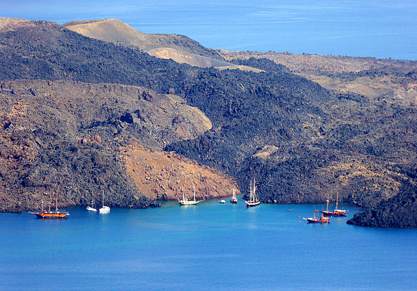 Excursion boats at the volcano Nea Kameni in Santorini.